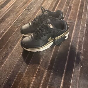 Nike Black and Gold Low-Top Sneakers